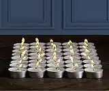 Pomp Glow Tealights (24 Pack) | White Unscented Decorative Tea Light Candles That Will Light Up Your Home, Wedding, Dinner & Any Special Occasion | Long Lasting, Smokeless, Mess Free Candles